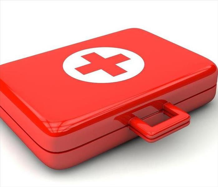 Red safety kit with a white and red emergency symbol